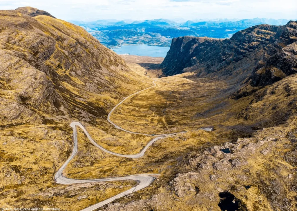winding road through Scottish Highlands