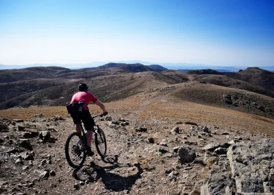 mountain biker riding technical terrain in Sardinia